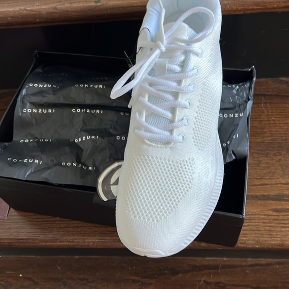 Brand New inbox Conzuri Ice Runners. I paid 154.99 USD. - Picture 2 of 5